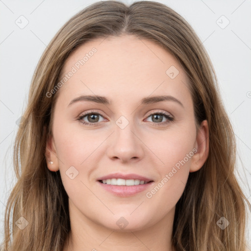 Joyful white young-adult female with long  brown hair and grey eyes