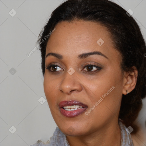 Joyful black young-adult female with medium  brown hair and brown eyes