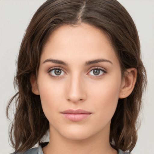 Neutral white young-adult female with medium  brown hair and brown eyes