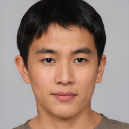 Neutral asian young-adult male with short  brown hair and brown eyes