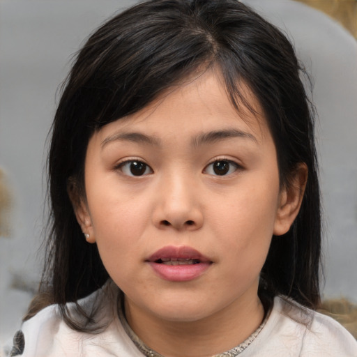 Neutral asian child female with medium  brown hair and brown eyes