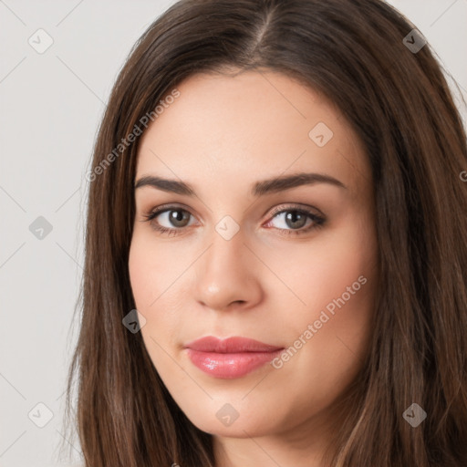 Neutral white young-adult female with long  brown hair and brown eyes