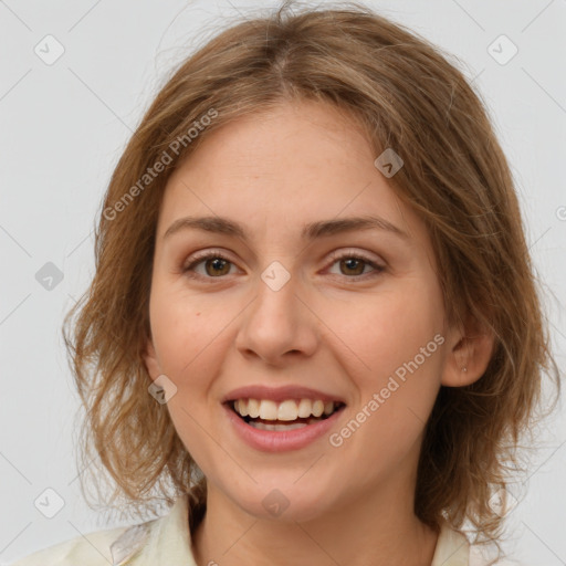 Joyful white young-adult female with medium  brown hair and green eyes