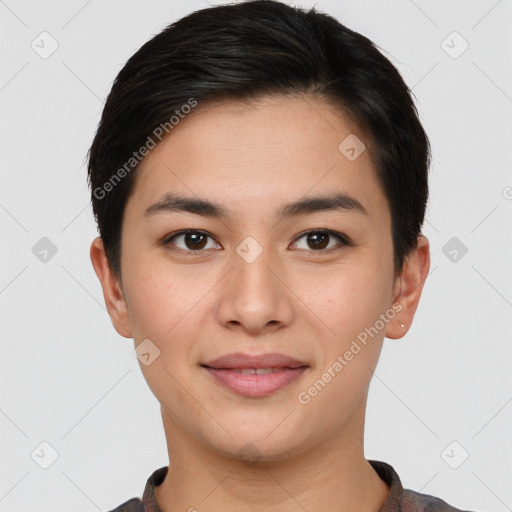 Joyful asian young-adult female with short  brown hair and brown eyes