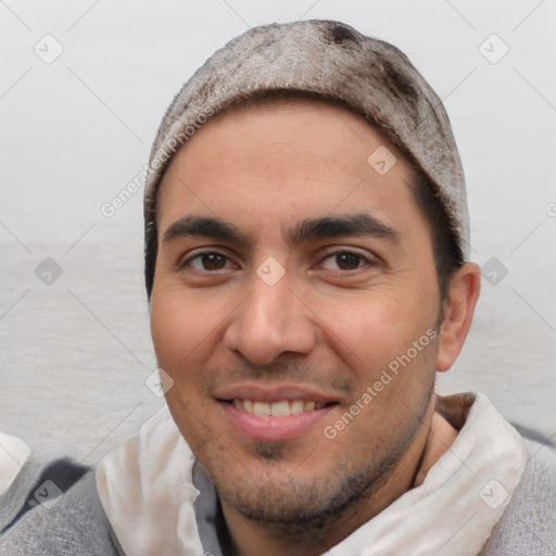 Joyful white young-adult male with short  black hair and brown eyes