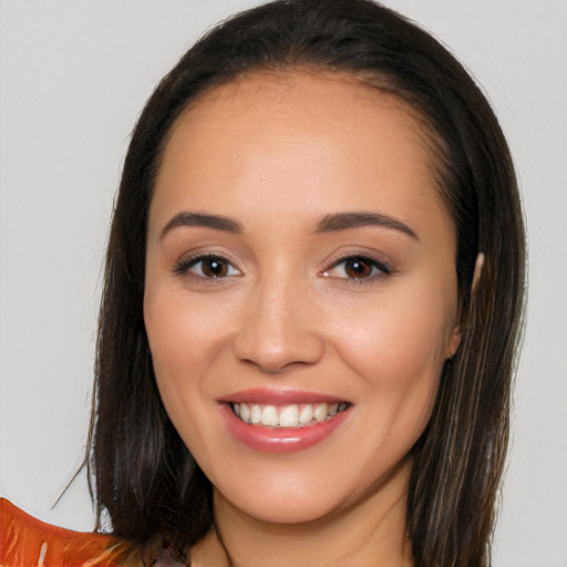 Joyful white young-adult female with long  brown hair and brown eyes