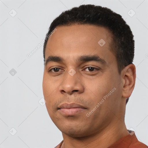 Neutral latino young-adult male with short  black hair and brown eyes