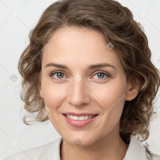 Joyful white young-adult female with medium  brown hair and green eyes