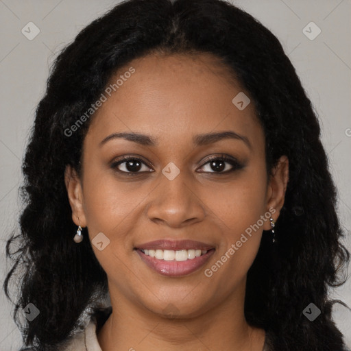 Joyful black young-adult female with long  brown hair and brown eyes