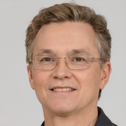 Joyful white middle-aged male with short  brown hair and grey eyes