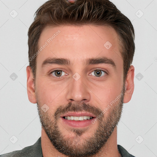 Joyful white young-adult male with short  brown hair and grey eyes