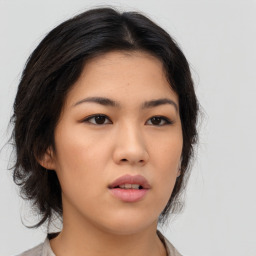 Neutral asian young-adult female with medium  brown hair and brown eyes