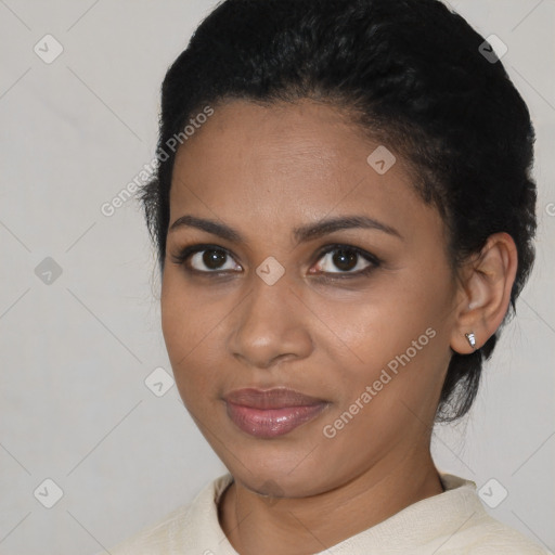 Joyful latino young-adult female with short  black hair and brown eyes