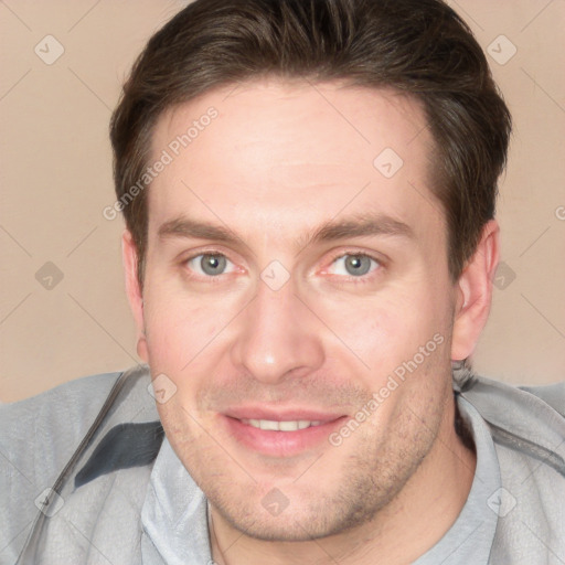 Joyful white adult male with short  brown hair and brown eyes