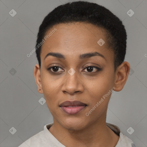 Joyful black young-adult female with short  black hair and brown eyes