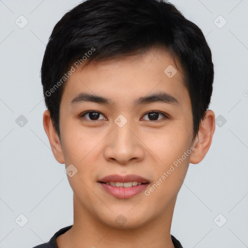 Joyful asian young-adult male with short  black hair and brown eyes