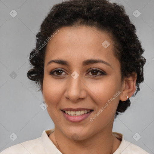 Joyful latino young-adult female with short  brown hair and brown eyes