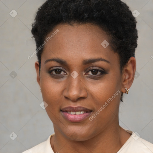 Joyful black young-adult female with short  brown hair and brown eyes