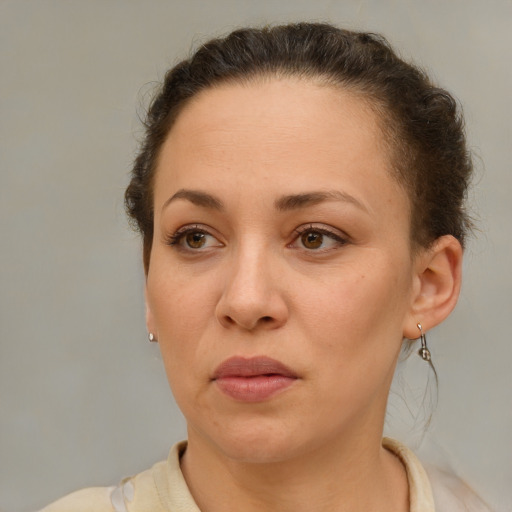 Neutral white adult female with short  brown hair and brown eyes