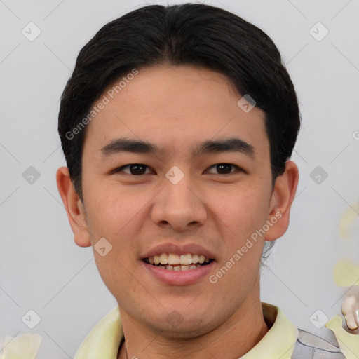 Joyful asian young-adult male with short  black hair and brown eyes