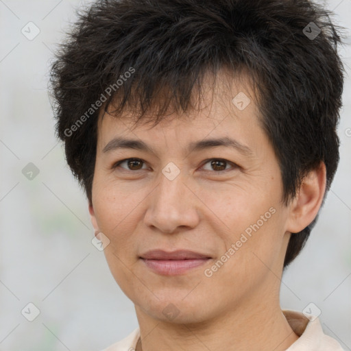 Joyful white adult female with short  brown hair and brown eyes