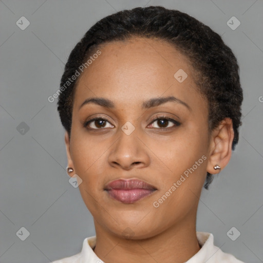 Joyful latino young-adult female with short  brown hair and brown eyes