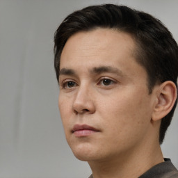 Neutral white young-adult male with short  black hair and brown eyes