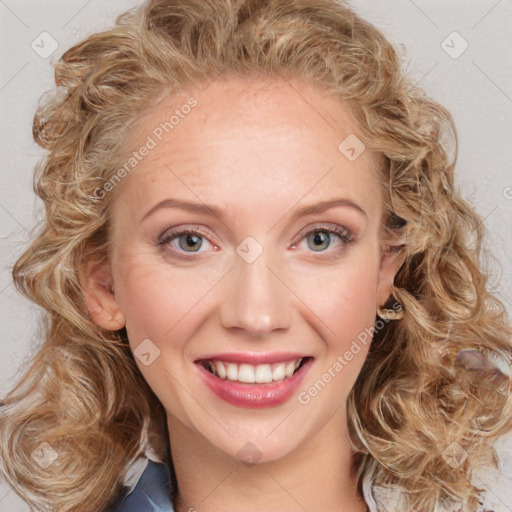 Joyful white young-adult female with long  brown hair and blue eyes