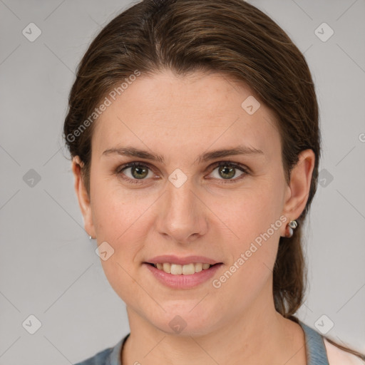 Joyful white young-adult female with medium  brown hair and grey eyes