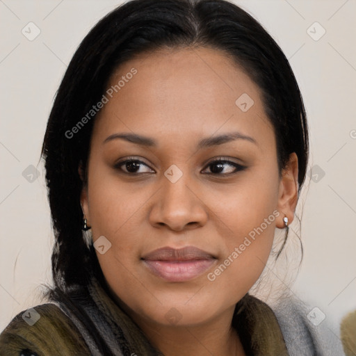 Joyful black young-adult female with long  brown hair and brown eyes