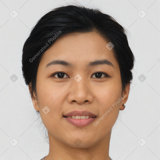 Joyful asian young-adult female with medium  black hair and brown eyes