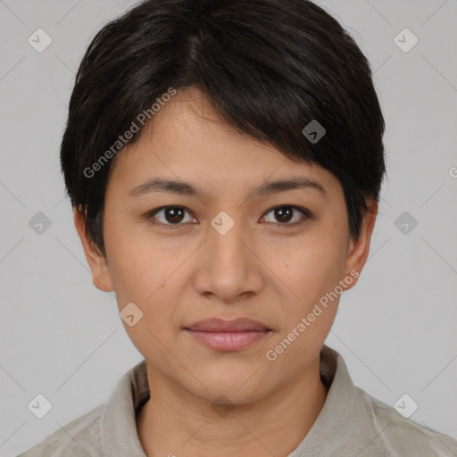 Joyful asian young-adult female with short  brown hair and brown eyes