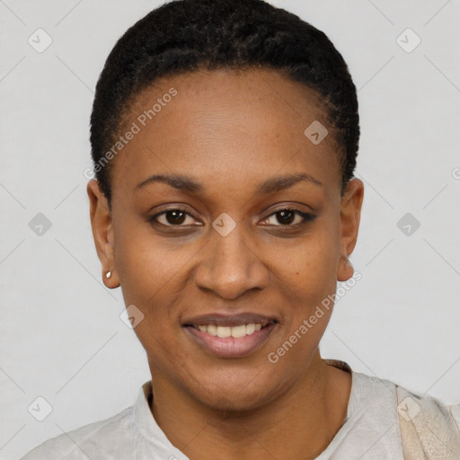 Joyful black young-adult female with short  black hair and brown eyes