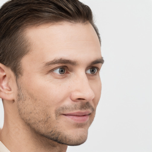 Neutral white young-adult male with short  brown hair and brown eyes