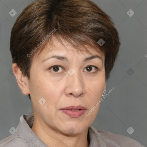 Joyful white adult female with short  brown hair and brown eyes