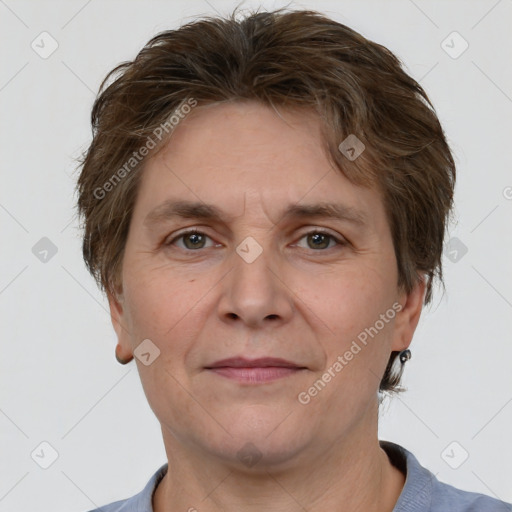 Joyful white adult male with short  brown hair and grey eyes