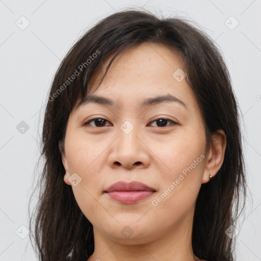 Joyful white young-adult female with medium  brown hair and brown eyes