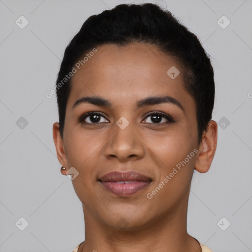 Joyful latino young-adult female with short  black hair and brown eyes