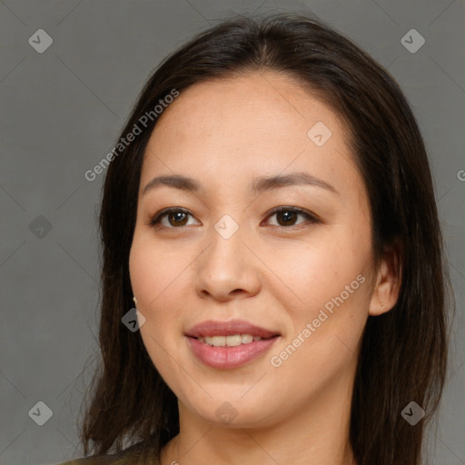 Joyful asian young-adult female with long  brown hair and brown eyes