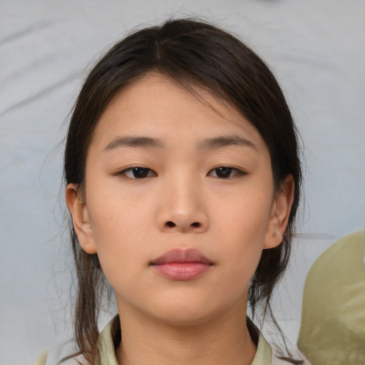 Neutral asian young-adult female with medium  brown hair and brown eyes