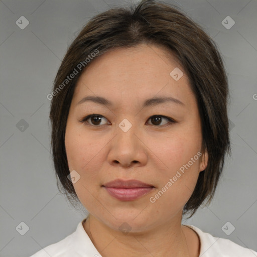 Joyful white adult female with medium  brown hair and brown eyes