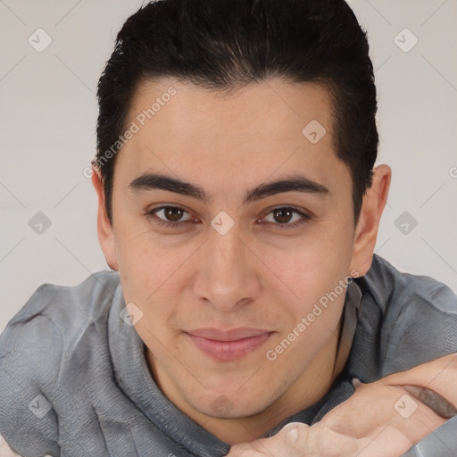 Joyful latino young-adult male with short  brown hair and brown eyes