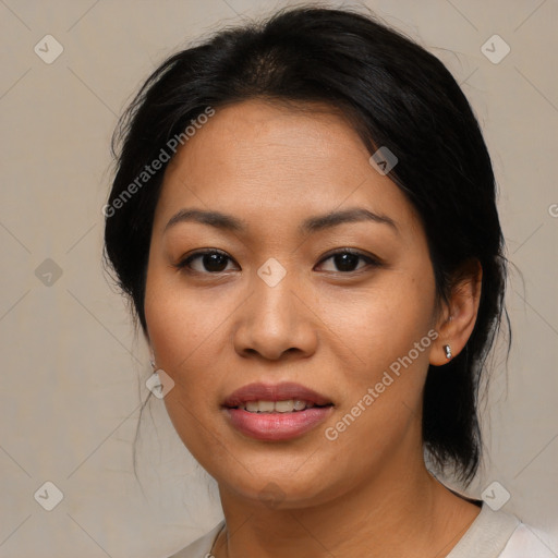 Joyful asian young-adult female with medium  black hair and brown eyes