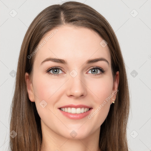 Joyful white young-adult female with long  brown hair and grey eyes