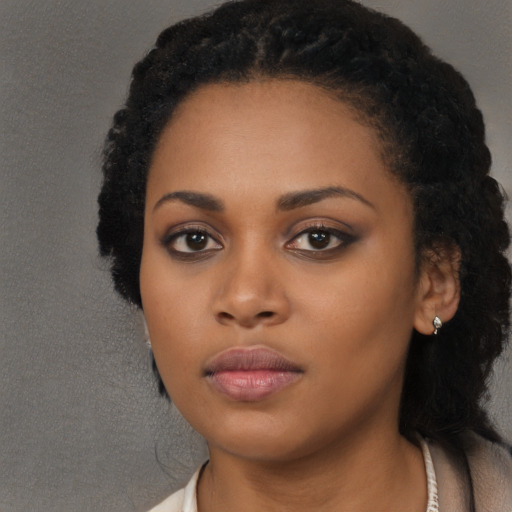 Neutral black young-adult female with long  black hair and brown eyes