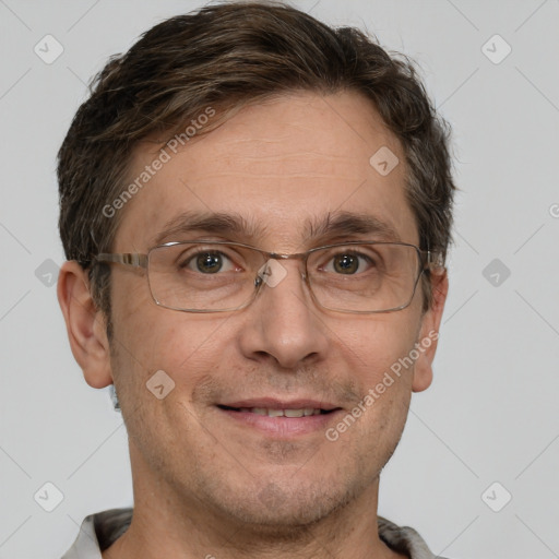 Joyful white adult male with short  brown hair and grey eyes