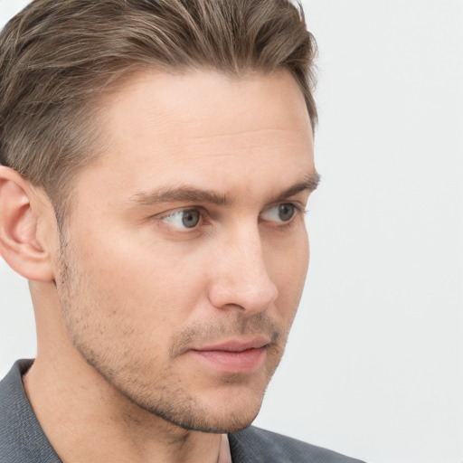 Neutral white young-adult male with short  brown hair and grey eyes