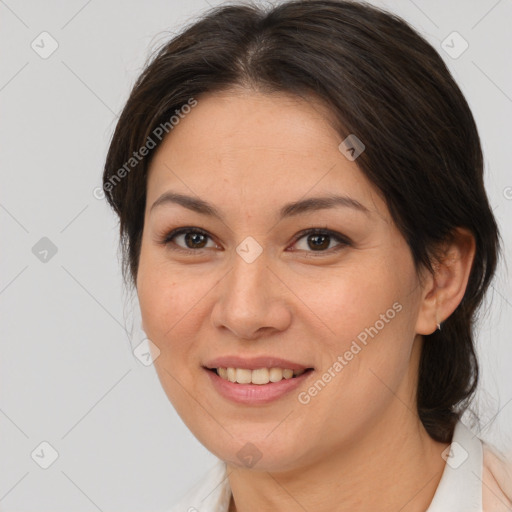 Joyful white young-adult female with medium  brown hair and brown eyes