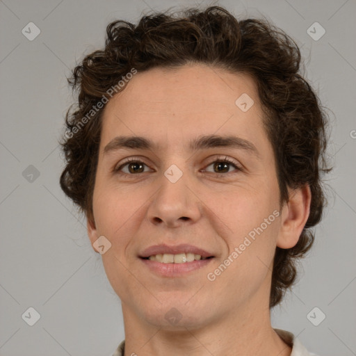 Joyful white young-adult male with medium  brown hair and brown eyes