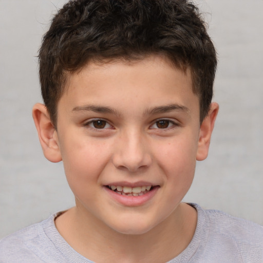 Joyful white child male with short  brown hair and brown eyes